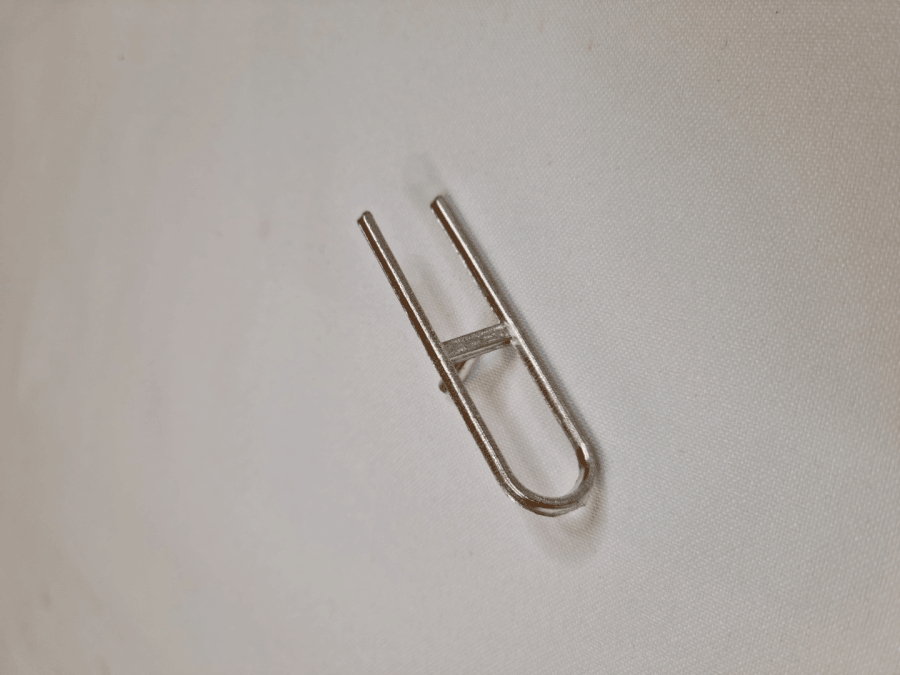 Metalinis antspaudas tilakai